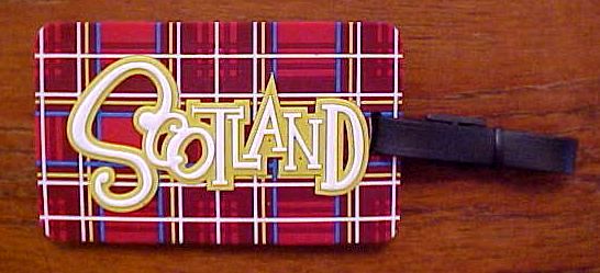 Tartan front design with "Scotland" and name plate on back.
